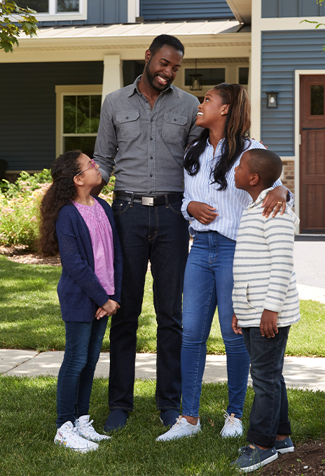 Family on front lawn