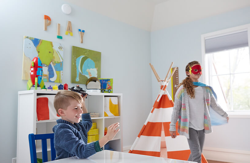 kids are playing in their living room.